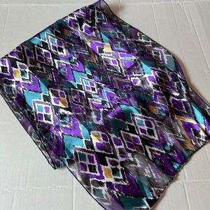 Scarf, silk looking, made of 100% polyester.